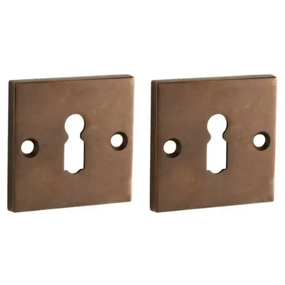 Set van twee sleutelplaatjes Bauhaus messing antiek brons Koopje