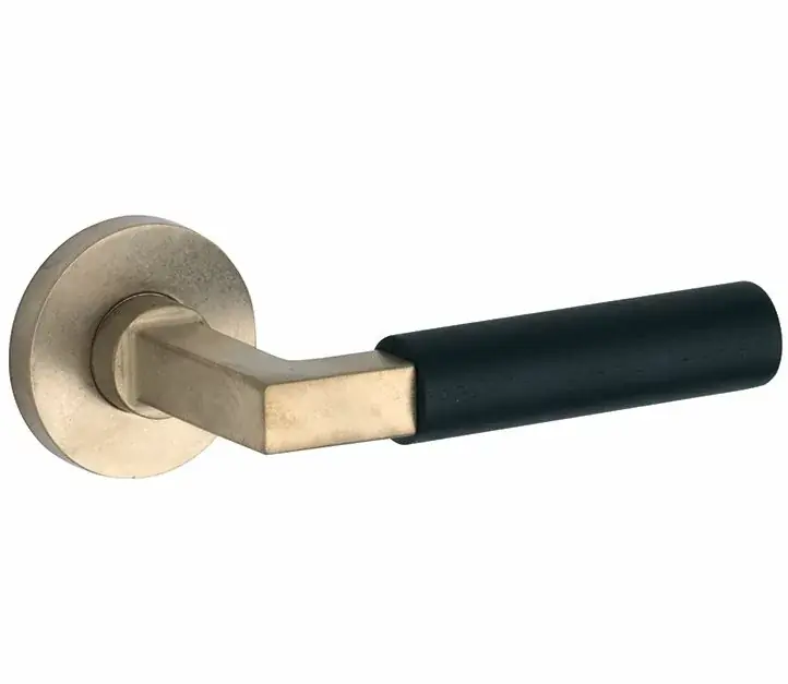 Speciale Aanbieding Deurklink op geveerd rozet Bauhaus ebben/Vivo messing antiek