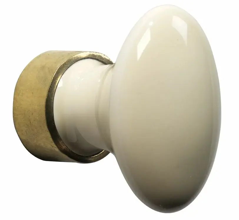 Bestseller Meubelknop ovaal porselein 33mm ivoor/messing ongelakt